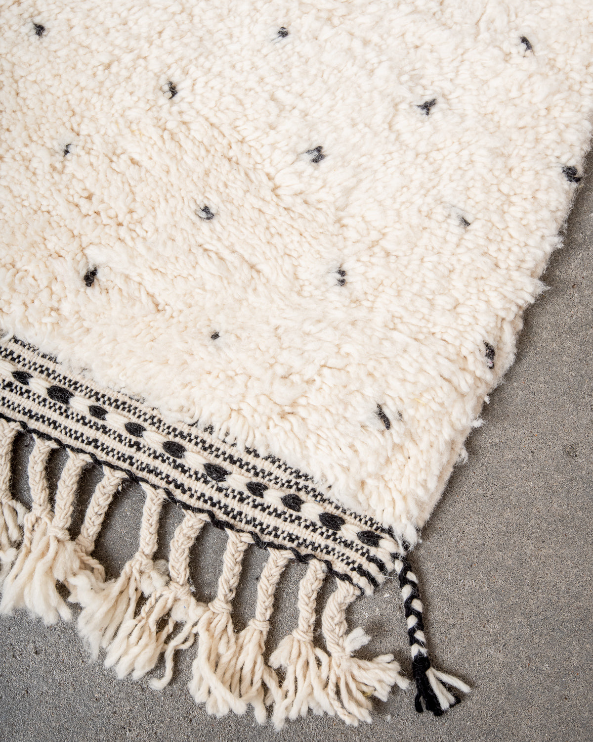 Modern, designer, handcrafted Berber rug from Morocco. Beniourain carpet with beautiful colours and patterns and fluffy wool texture.
